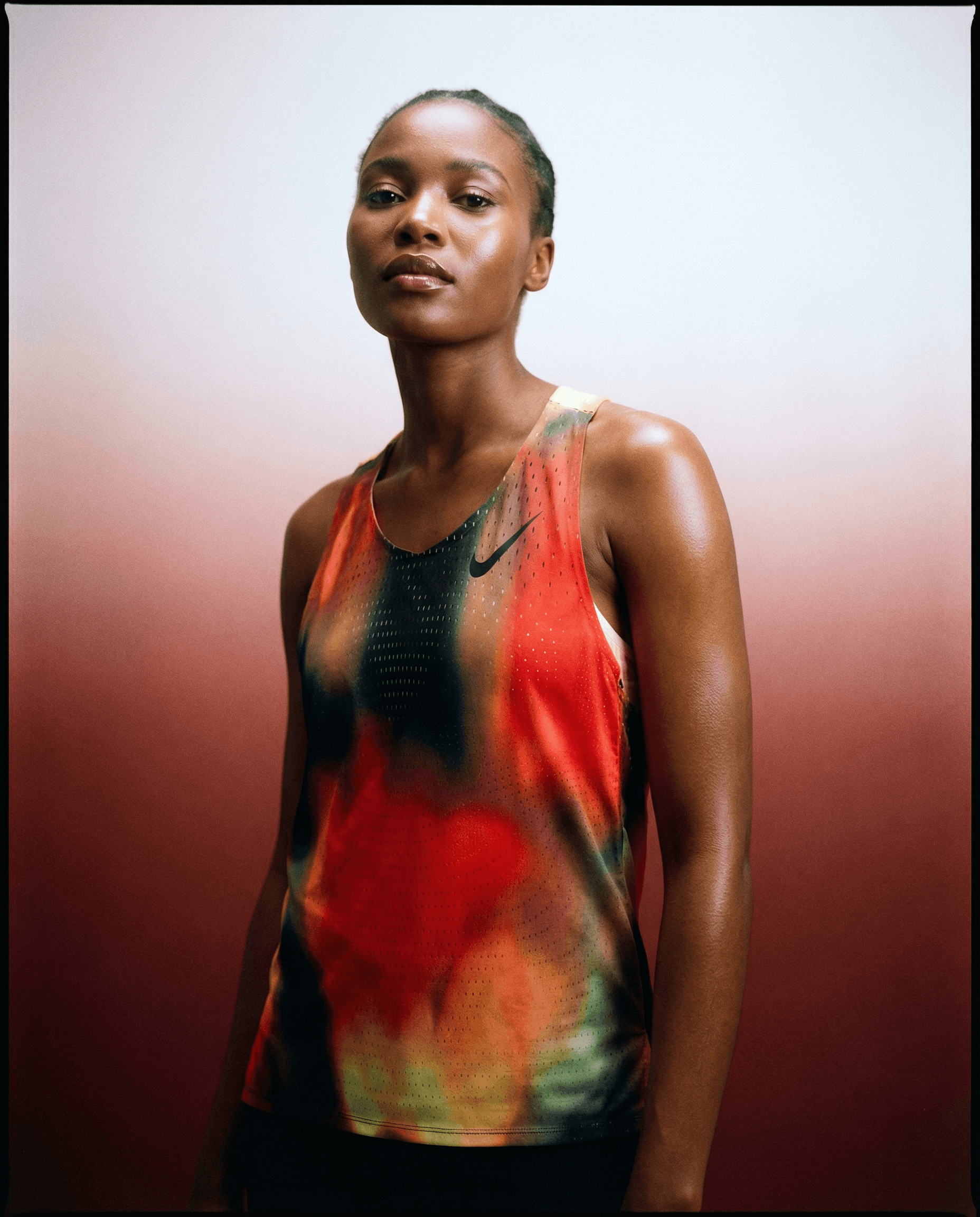 Namibian woman wearing athletic mesh tank — AI body sizing